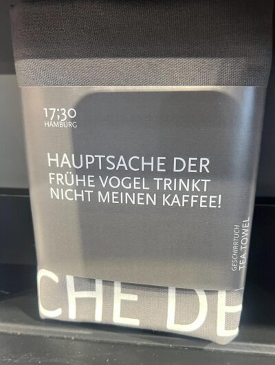 17;30 Geschirrtuch "Der frühe Vogel" grau mit weiß